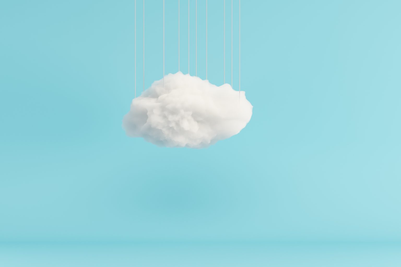 Image d'un nuage blanc en 3D devant un fond bleu uni